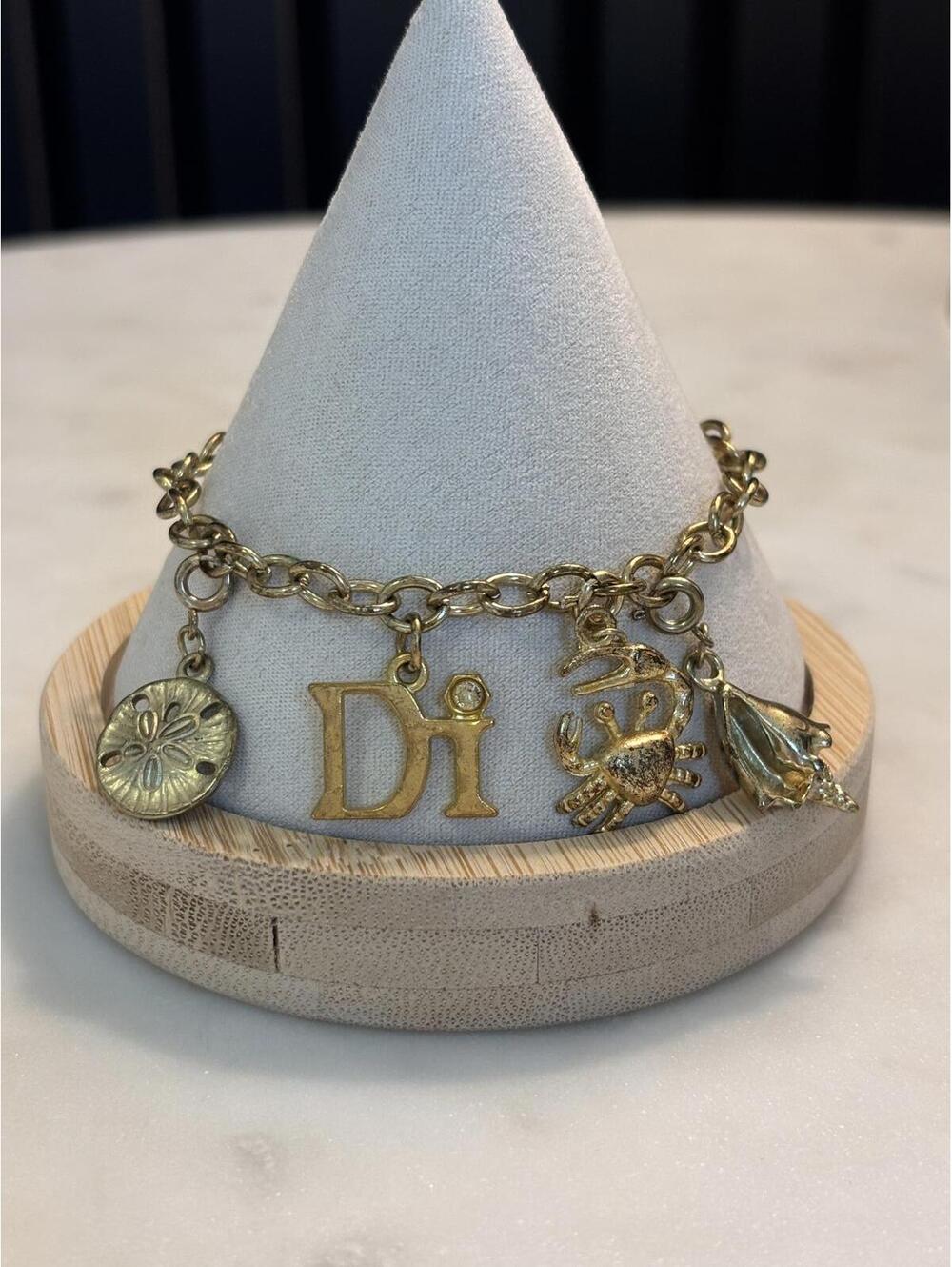 Gold Tone Charm Bracelet with 'Di' and Floral Charms